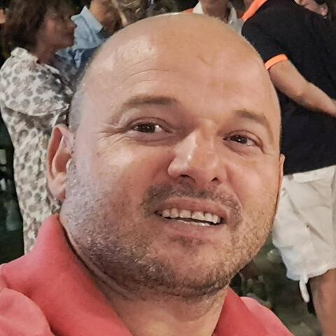 OLGER CACI NIKA